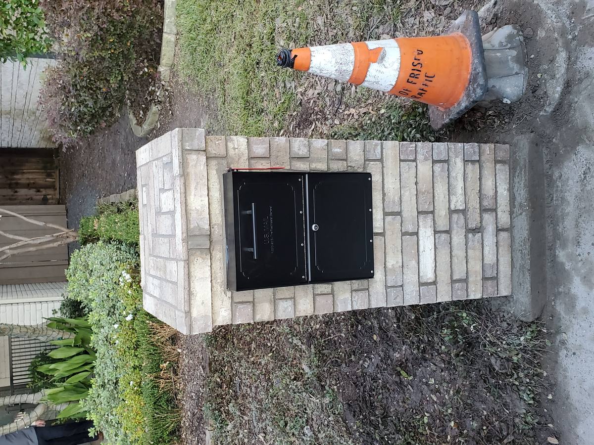 Mailbox replaced after car knocked it down